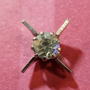 Vintage tie pin with clear gem in an X setting